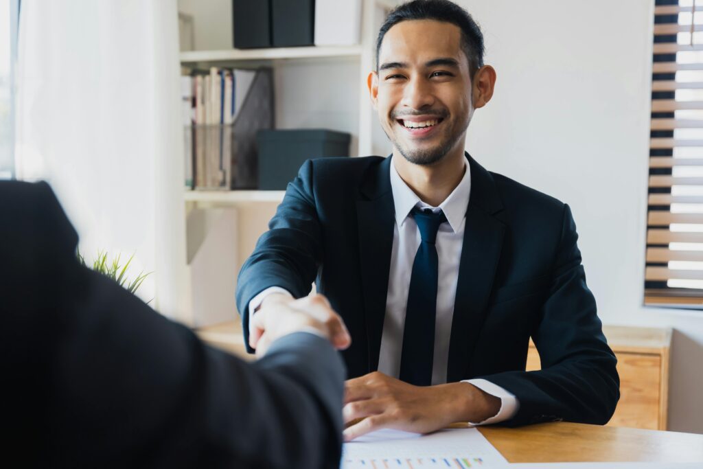 Young Man Shaking Hand